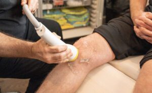 What Is Shockwave (SoftWave TRT) Therapy and How Does It Help with Soft Tissue Injuries?